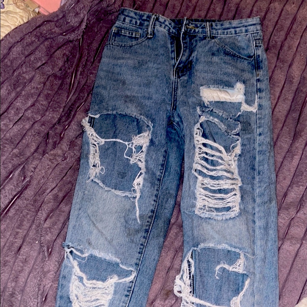 Distressed Blue Denim Jeans